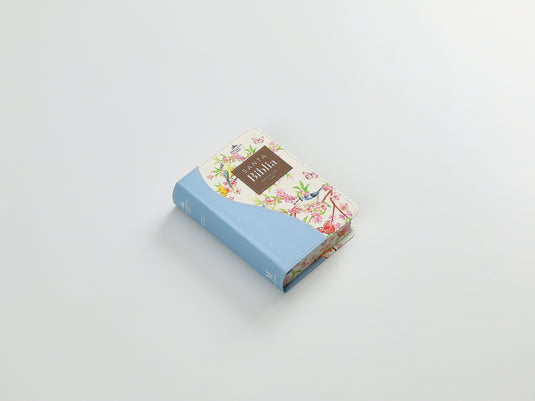 Biblia de Bolsillo RVR 1960, imitación piel celeste flores y pájaros