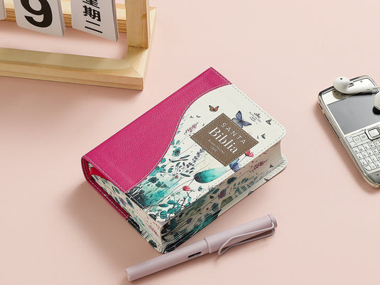 Biblia de Bolsillo RVR 1960, imitación piel fucsia flores y mariposas