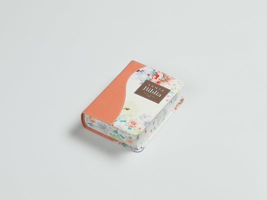 Biblia de Bolsillo RVR 1960, imitación piel naranja flores