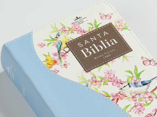 Biblia de Bolsillo RVR 1960, imitación piel celeste flores y pájaros