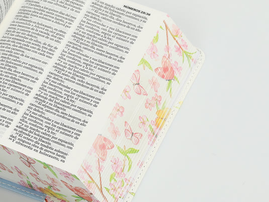 Biblia de Bolsillo RVR 1960, imitación piel celeste flores y pájaros