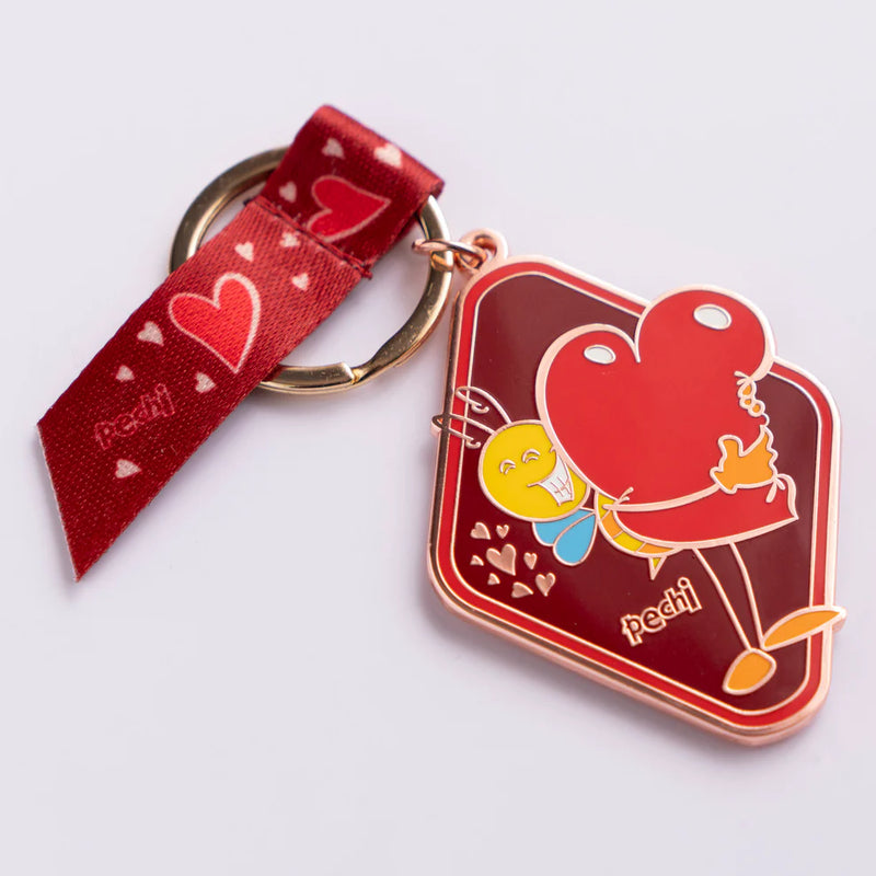 Cargue la imagen en el visor de la galería, Llavero Pechi Amor con lazo decorativo
