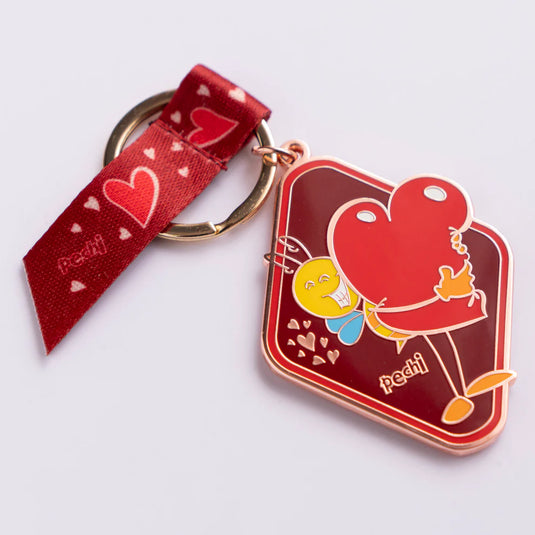 Llavero Pechi Amor con lazo decorativo